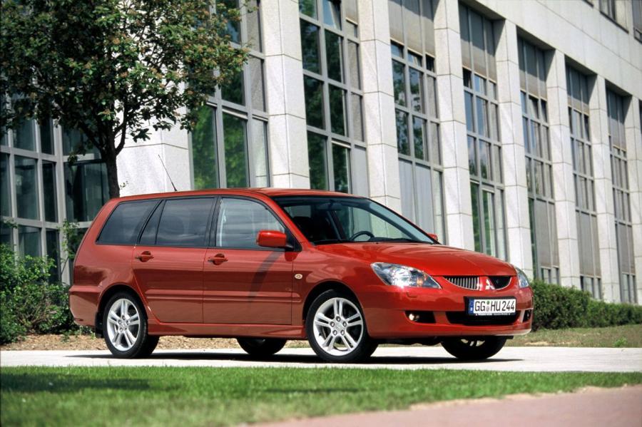  Mitsubishi Lancer 2000 года  (фото 28 из 31)